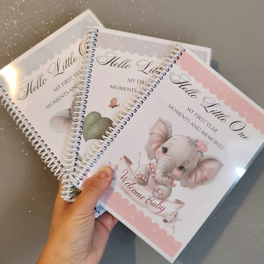 Stack of baby-themed notebooks 