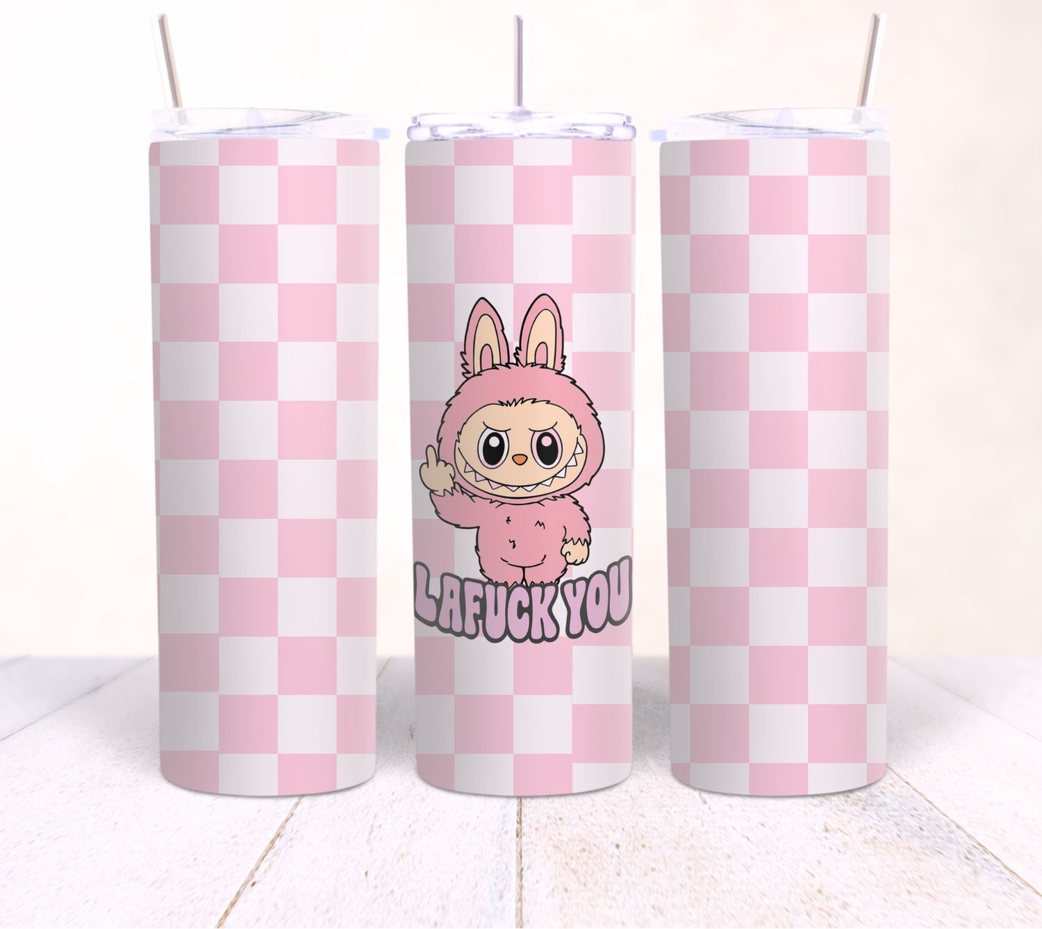 Three pink and white checkered tumblers with a cartoon character and text on a white background