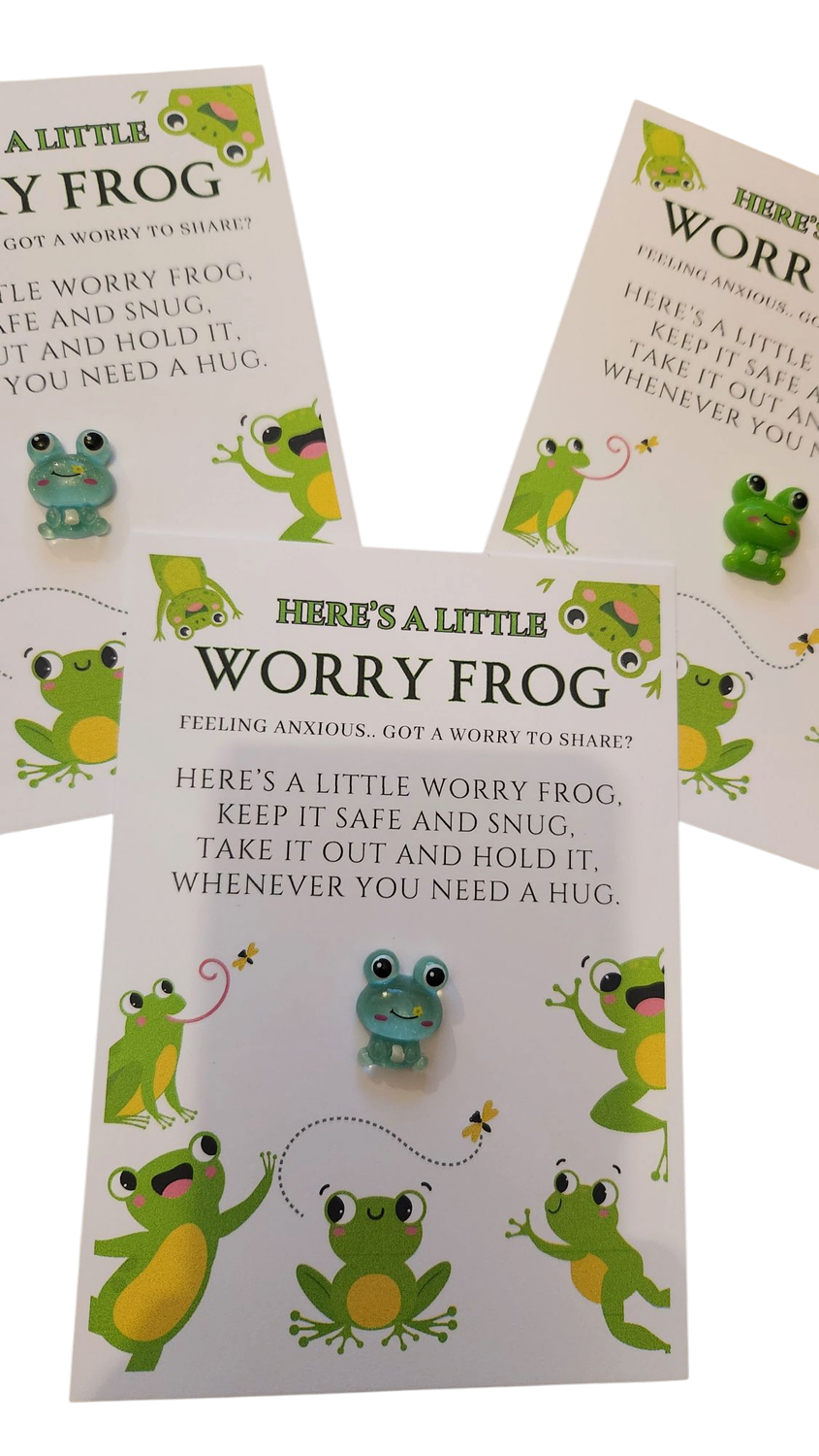 Worry frog earrings with packaging on a white background
